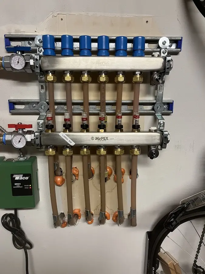 Plumber performing Water Heater Repair at a residential property in Oregon